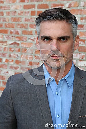 Stern looking businessman close up Stock Photo