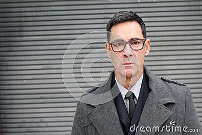 Stern looking businessman close up with copy space Stock Photo