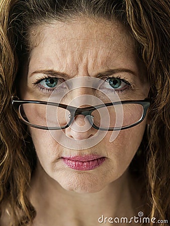 https://thumbs.dreamstime.com/x/stern-school-teacher-middle-aged-female-frowning-over-her-glasses-31664233.jpg