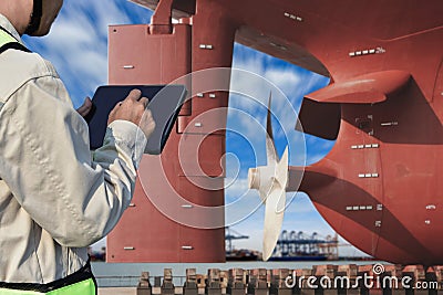 Stern ship moored in floating dry dock, Ship repair in shipyard Stock Photo