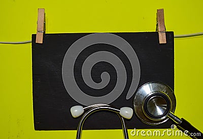 A stethoscope and blackboard medical, health and education concepts Stock Photo