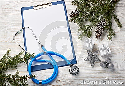 Stethoscope and Christmas decorations. Stock Photo