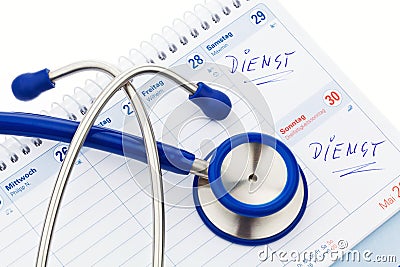 Stethoscope and calendar. Medical appointment Stock Photo