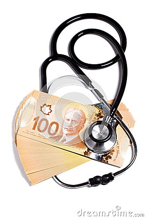 Stethoscope and Canadian dollar Editorial Stock Photo