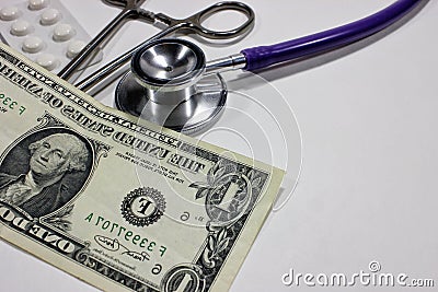 Stethoscope dollar , expenditure on health or financial assistance Stock Photo