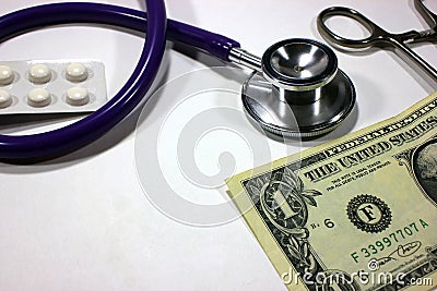 Stethoscope dollar , expenditure on health or financial assistance Stock Photo