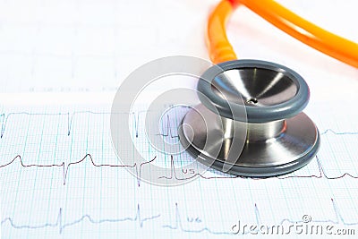 Stethoscope on electrocardiogram - ECG Stock Photo