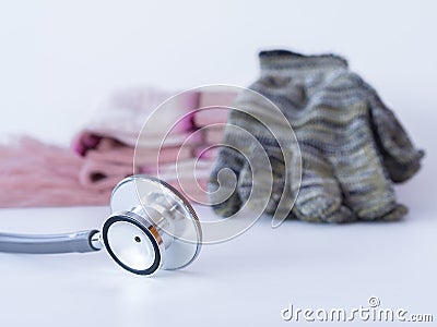 Stethoscope, glove and Neckwear Winter on white background Stock Photo