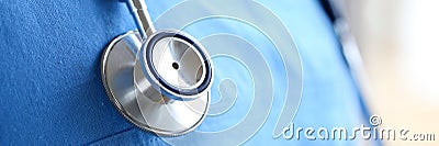 Stethoscope head lying on medicine therapeutist doctor chest Stock Photo