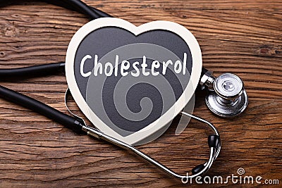 Stethoscope And Heart With Word Cholesterol Stock Photo