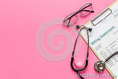 Stethoscope with medical billing statement. Top view Stock Photo