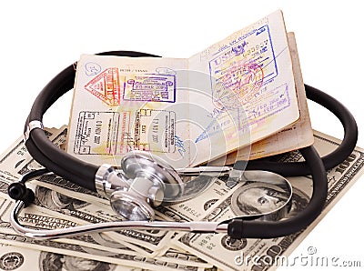Stethoscope, money and passport. Stock Photo