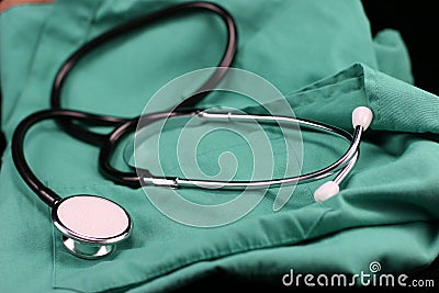 Stethoscope and nurse smock. Stock Photo