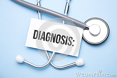 Stethoscope, paper with diagnosis, text on the medical table Stock Photo