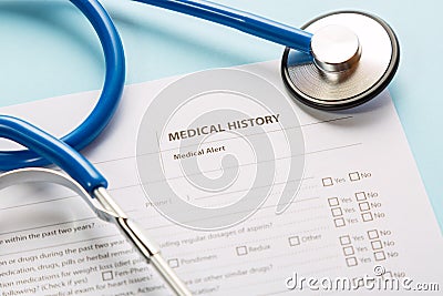 Stethoscope and patient medical history form. Health check diagnostics concept Stock Photo