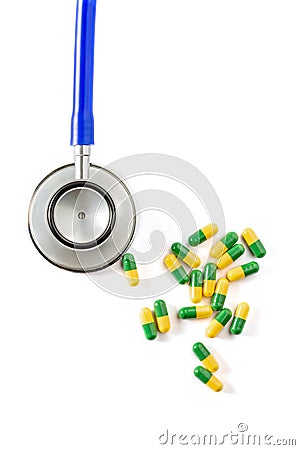 Stethoscope and some pills Stock Photo