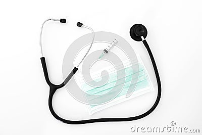 Stethoscope, syringe and mask Stock Photo