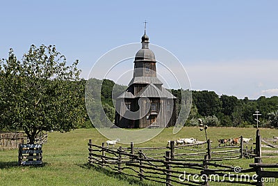 Stetsivka, Ukraine - August 14, 2021: Wooden church of St. Nicholas in Cossack Village, an open-air museum of Cossack culture near Editorial Stock Photo