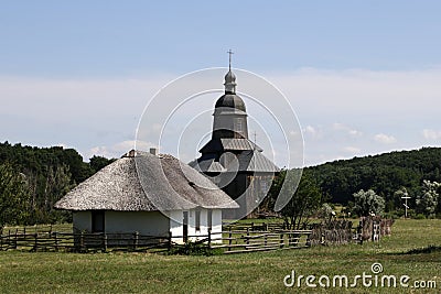 Stetsivka, Ukraine - August 14, 2021: Wooden church of St. Nicholas in Cossack Village, an open-air museum of Cossack culture near Editorial Stock Photo