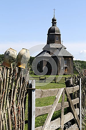 Stetsivka, Ukraine - August 14, 2021: Wooden church of St. Nicholas in Cossack Village, an open-air museum of Cossack culture near Editorial Stock Photo