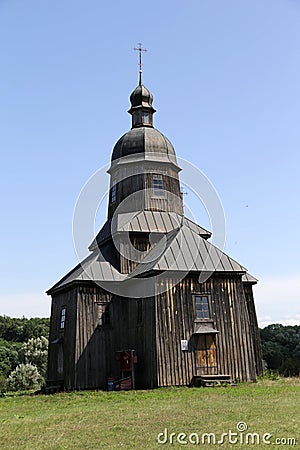 Stetsivka, Ukraine - August 14, 2021: Wooden church of St. Nicholas in Cossack Village, an open-air museum of Cossack culture near Editorial Stock Photo