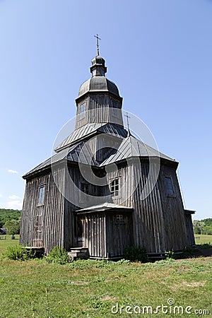 Stetsivka, Ukraine - August 14, 2021: Wooden church of St. Nicholas in Cossack Village, an open-air museum of Cossack culture near Editorial Stock Photo