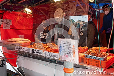 Steveston Harbour Fisherman Wharf. Fishermen sell fish on the boat. People wearing face mask during covid-19 pandemic period. Editorial Stock Photo