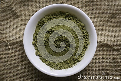 Stevia powder in white plate on rug sack Stock Photo