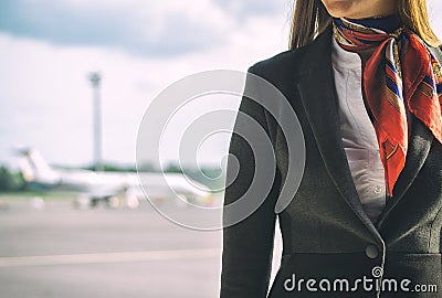 Stewardess on the airfield. Stock Photo