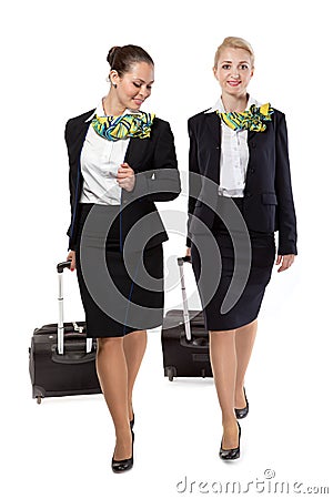 Stewardess with luggage bags Stock Photo