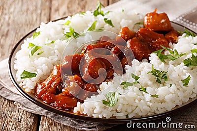 Stewed Bourbon chicken in sauce with whiskey, sugar, ginger and Stock Photo