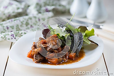 Stewed meat with vegetables Stock Photo