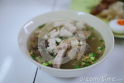 Stewed pork blood soup, pork bone broth Delicious Asian food in a white cup Stock Photo