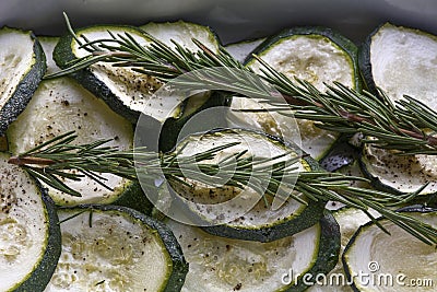 Stewed sliced zucchini with rosemary and pepper Stock Photo