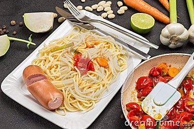 Stewed tomatoes in frying pan Stock Photo