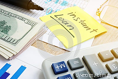 Stick with words Instant loan. Stock Photo