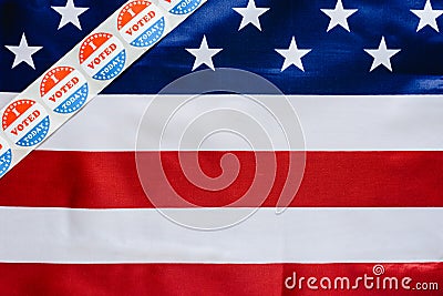 Sticker strip I vote today on the USA flag after voting in the ballot box Stock Photo