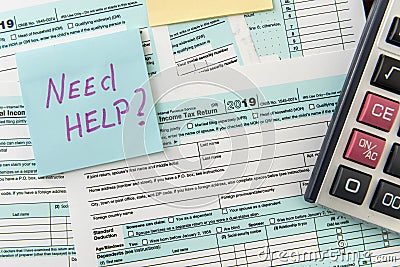 Sticker with text Need Help and 1040 tax form, pen and calculator. Deadline Editorial Stock Photo