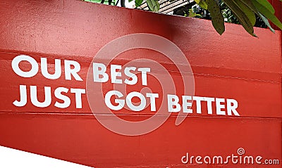 Sticker white color word is a Our best just got better on red wall for succession service industry business and commercial Stock Photo