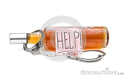 Sticker with word `help!` on bottle with alcohol drink and handcuffs on white Stock Photo