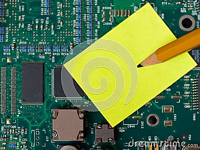 Stickie Note on Motherboard Stock Photo