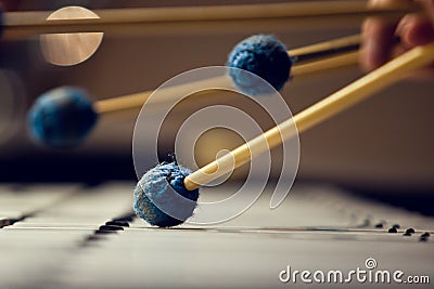 Sticks hitting a xylophone Stock Photo