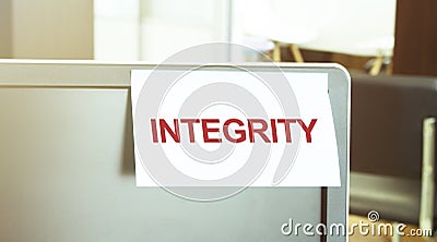 Sticky note on the computer. Text INTEGRITY Stock Photo