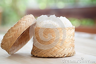 Sticky rice, Thai sticky rice in a bamboo wooden old style box Stock Photo