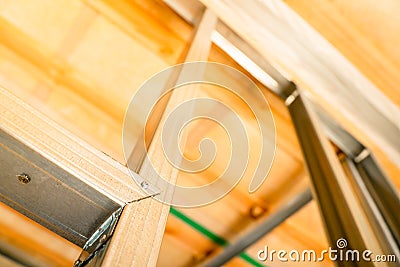 Stiffening ribs in a metal profile frame in a plasterboard wall close-up. Building a wall in a private house Stock Photo