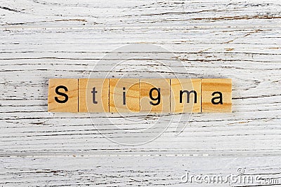 STIGMA word made with wooden blocks concept Stock Photo