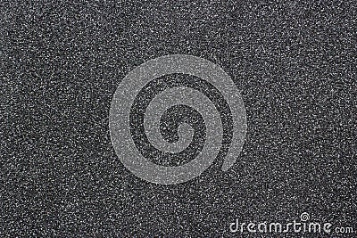 Still dark black paper texture background with clearly detailed natural grain noise texture effect. Stock Photo