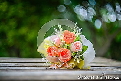 Still life with beautiful artificial roses Stock Photo