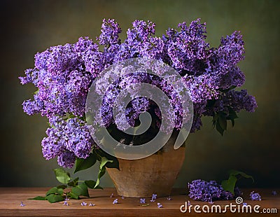 Still life with a bouquet of lilacs Stock Photo