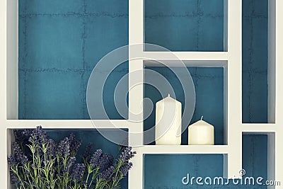 Still life of candle with flower on shelve Stock Photo